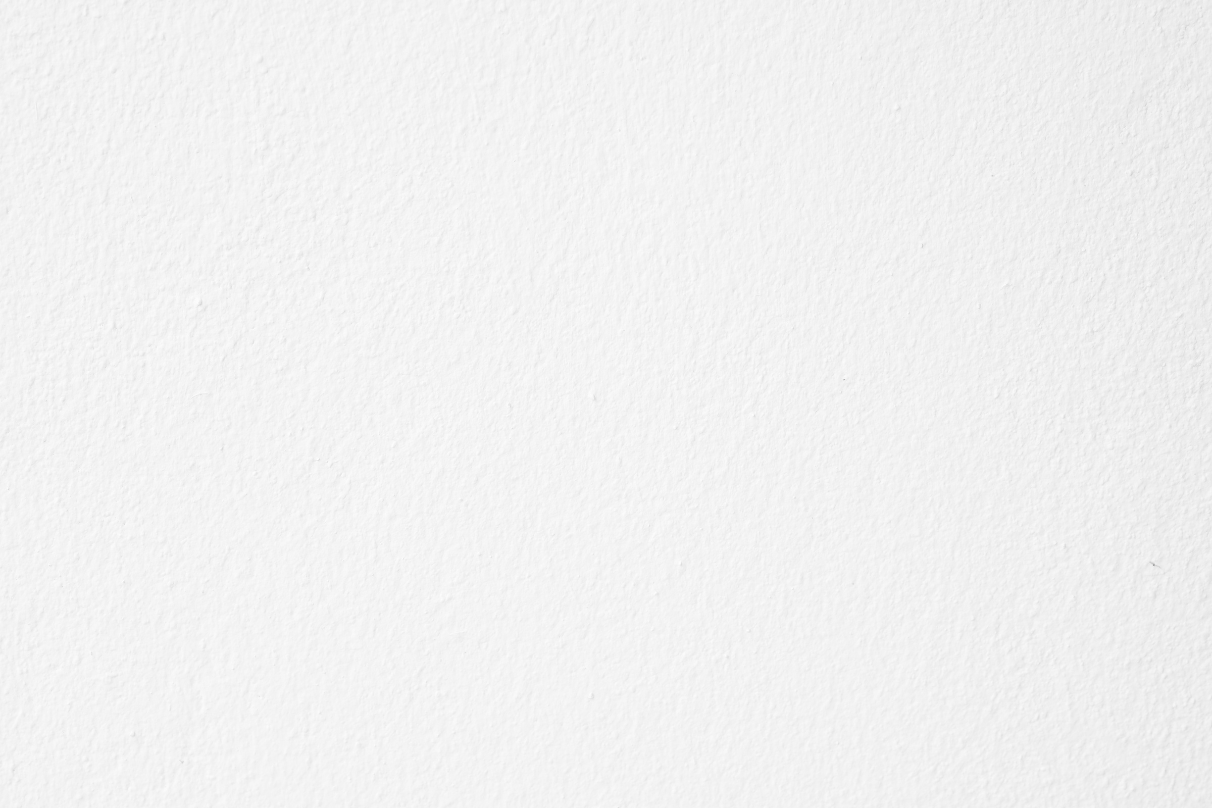 White textured wall background.